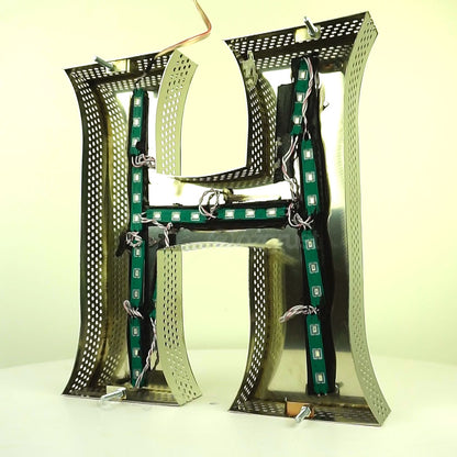 Malli 11V.1 - ruostumaton 3D Letter